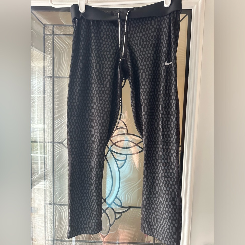 Nike capri leggings. Black w grey dots size small.